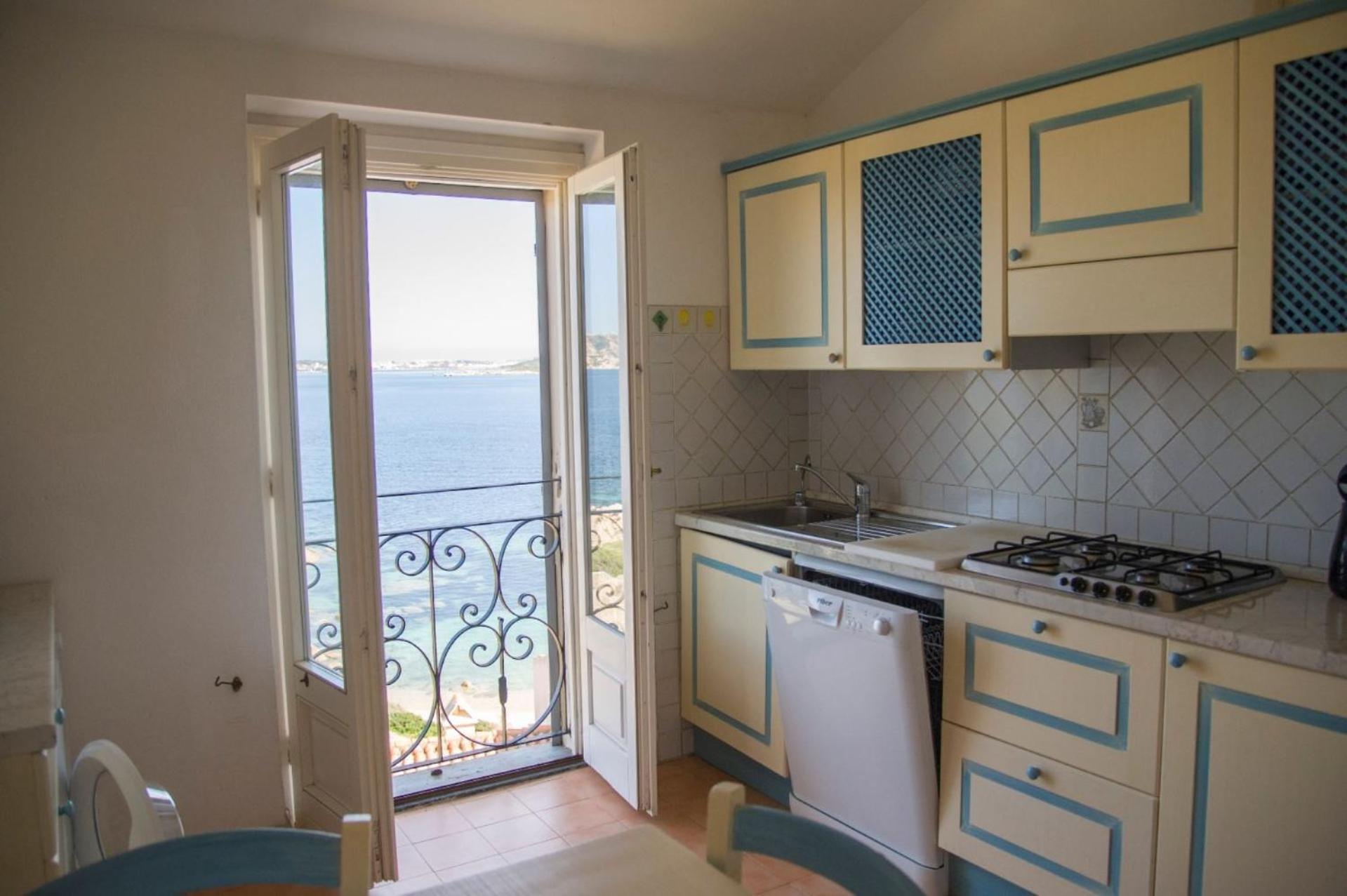 4 Faro - Attico Sul Faro Di Porto Faro Villa Палау Стая снимка